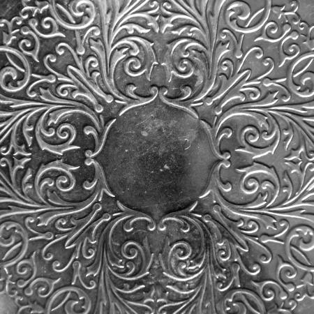 Silver metal plate with classic ornament