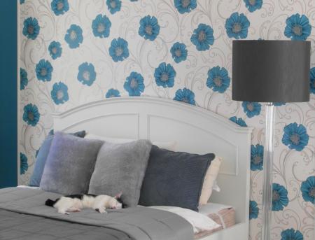 Sleeping Cat on a Bed