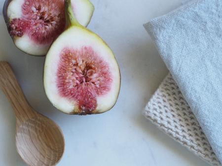 Slice Fruit Beside the Brown Wooden Spatula