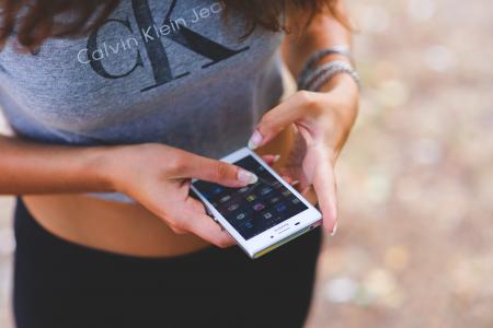 Smartphone in girl's hands