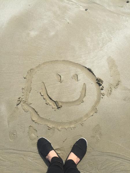 Smiley Drawing on Sand