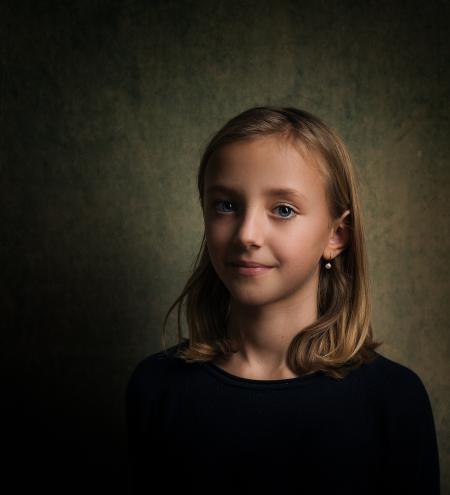 Smiling Girl With Blonde Hair Wearing Black Crew-neck Shirt