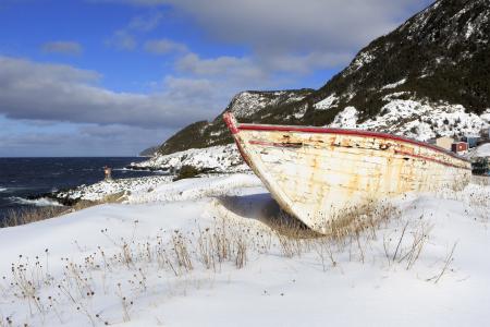 Snow covered fishing boats