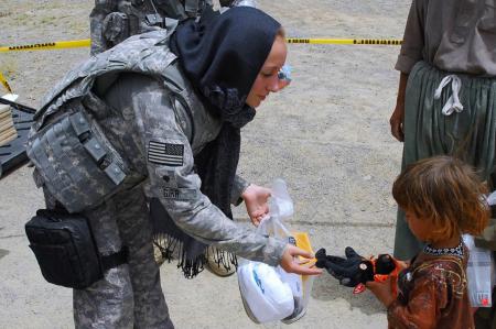 Soldier giving Toys to Kids