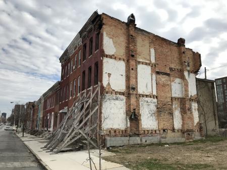 Stabilized vacant rowhouse following demolition, 1000 block of W. Fayette Street (south side), Baltimore, MD 21223