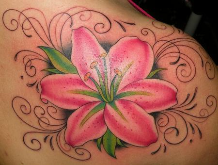 Realistic stargazer lily coverup tattoo by Sorin Gabor TattooNOW