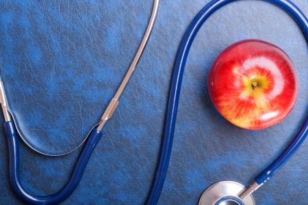 Stethoscope and apple