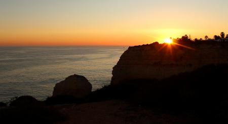 Sunset over the cliffs in Algarve