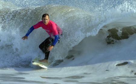 Surfer Playing with the Waves