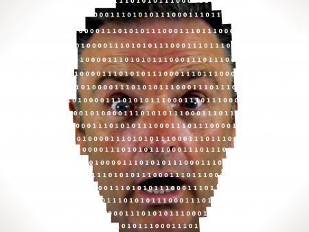 Surprised man looking into binary code - The online privacy problem