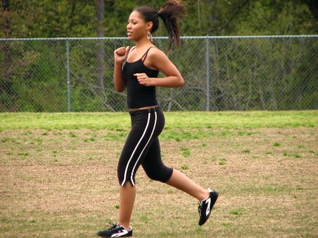 Teen African American girl running