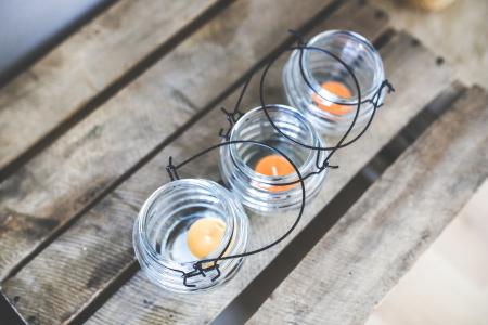 Three candleholders with tealights