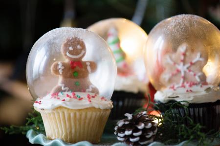 Three Christmas-themed Glass Snow Globes