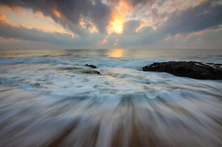 Time Lapse Photo of Water Current and Brown Rock Under White and Yellow Cloudy Sky