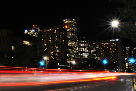 Time Lapse Photography of Red and Orange Taillight in City during Daytime