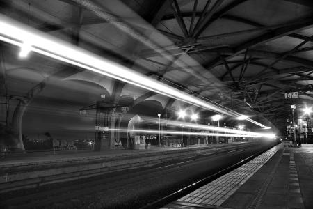 Timelapse Photo of Greyscale Train Passing by