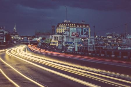Timelapse Photography of Street With Vehicle Moving during Night Time