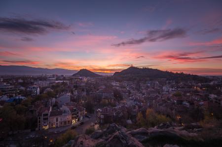 Top View Of Houses And Mountain During Sunset