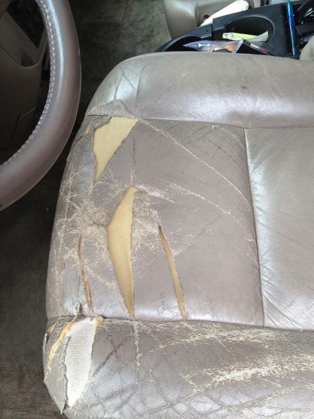 Torn leather seat