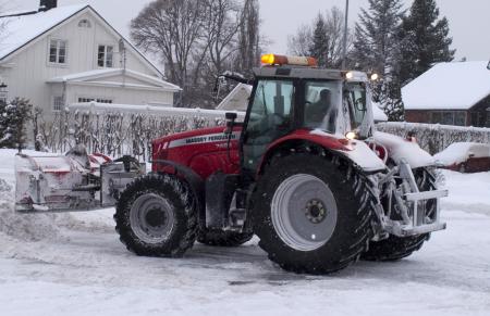Tractor clearing snow