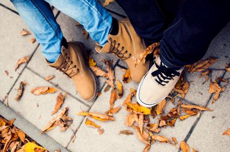 Two Pairs of Feet in Shoes