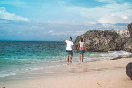 Two Person Walking on Sea Shore