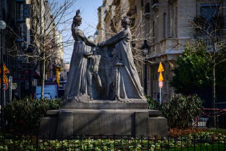 Two Woman Standing Statues