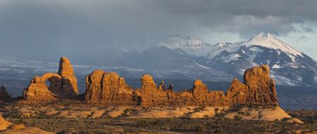 Valley Near Snowy Mountain during Daytime