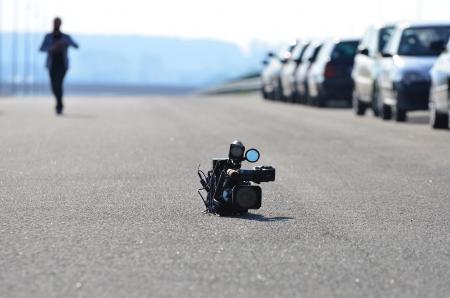 Video Camera on Asphalt Road