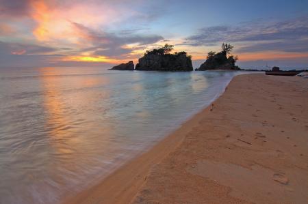 View of Beach Against Cloudy Sky