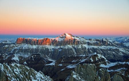 View of Snow Covered Mountain during Sunset