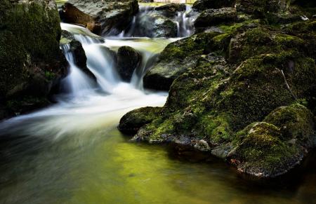 Water Fall Near Rock during Day Time