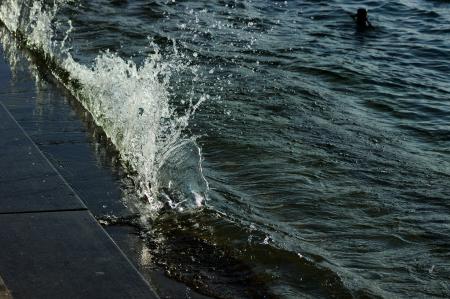 Wave Spray, Waves Crashing behind Warning Sign, Bregenz, Austria