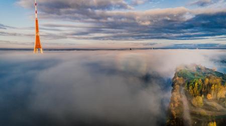 White an D Red Tower on Body of Water