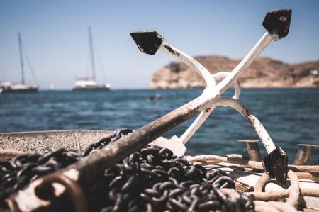 White and Black Anchor With Chain at Daytime