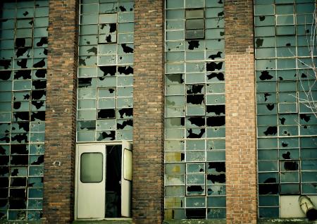 White and Black Door on Brown Brick Wall