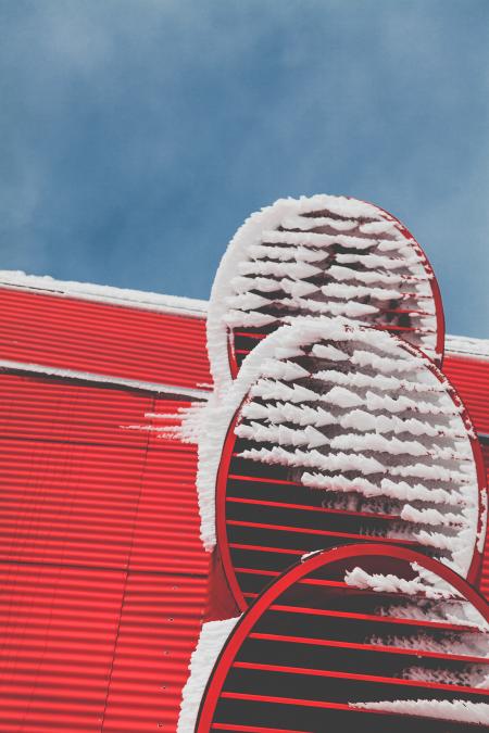 White and Red Window Under Gray Sky