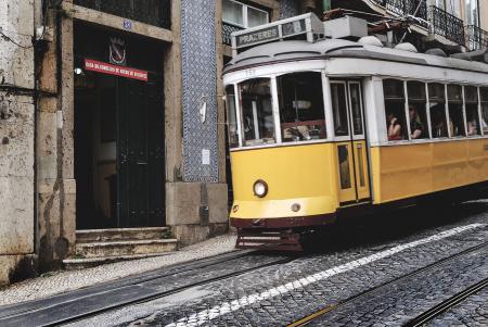 White and Yellow Train With Passenger