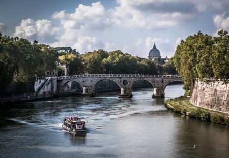 White Boat on Body of Water Crossing a Gray Concrete Bridge during Daytime