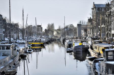 White Boat on Body of Water Under White Sky