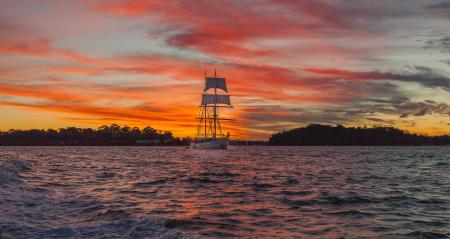 White Boat on Sea during Golden Time