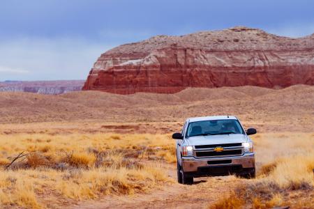 White Chevrolet Vehicle on Dessert