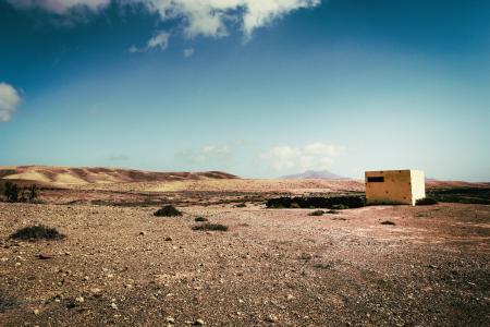 White Concrete Building on Desert