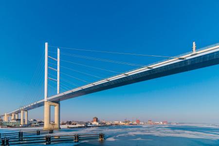 White Metal Bridge Under the Blue Sky