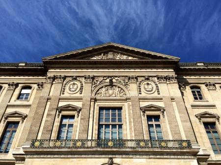 White Painted Building Under Blue Skies during Daytime