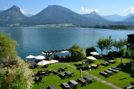 White Patio Umbrellas Near Sea at Daytime