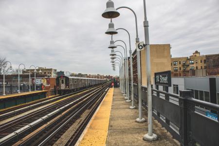 White Post Lamps Near Train Railway