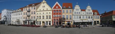 White Red and Beige Concrete Buildings