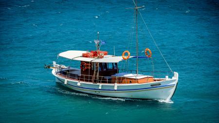 White Sail Boat On Sea