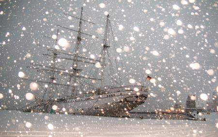 White Sailing Ship Docked at Pier